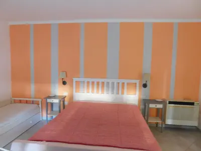Letto o letti in una camera di Casa Diana