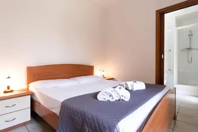 Letto o letti in una camera di Mirto 2 Apartment
