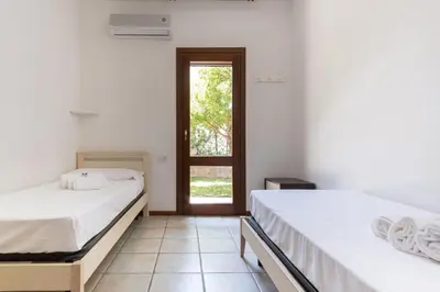 Letto o letti in una camera di Mirto 2 Apartment