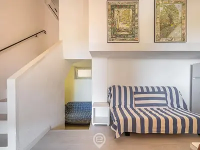Letto o letti in una camera di Porto Luna 25 - Hala