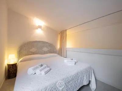 Letto o letti in una camera di Porto Luna 25 - Hala