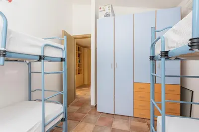 Letto o letti in una camera di Casa Leomilda