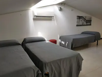 Letto o letti in una camera di You Welcome Apt