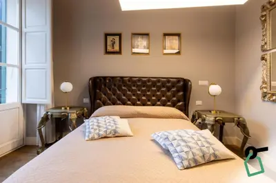 Letto o letti in una camera di Hotiday Cagliari Porto