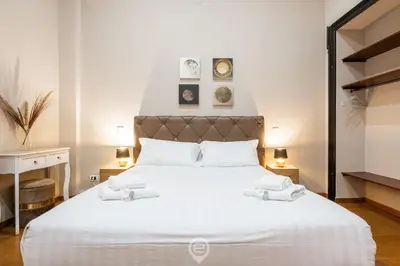 Letto o letti in una camera di Sardinia Holiday Suites