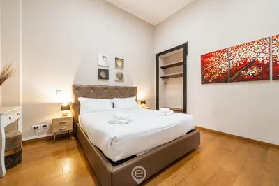 Letto o letti in una camera di Sardinia Holiday Suites