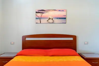 Letto o letti in una camera di Su Castangiu