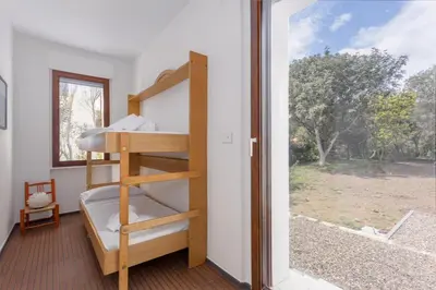 Letto o letti in una camera di Villa Toschi