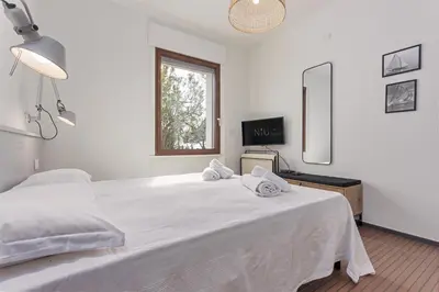 Letto o letti in una camera di Villa Toschi
