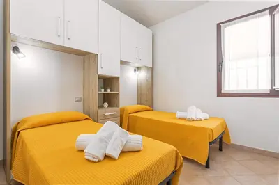 Letto o letti in una camera di Villa Tronciu