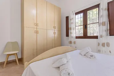 Letto o letti in una camera di Villa Tronciu