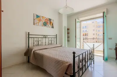 Letto o letti in una camera di GuestHost - Alma Karalis
