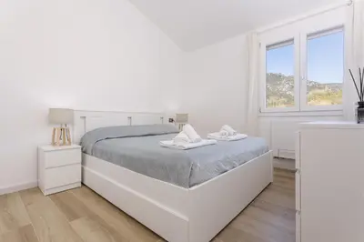 Letto o letti in una camera di Villa Aurora