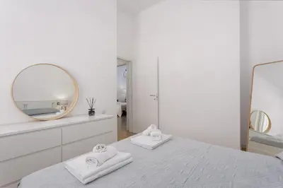 Letto o letti in una camera di Villa Aurora