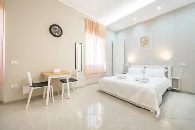 Letto o letti in una camera di San Benedetto Home