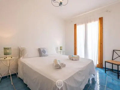 Letto o letti in una camera di Casa Ariel
