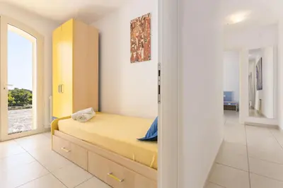 Letto o letti in una camera di Villa Paolo con piscina privata