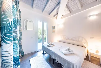 Letto o letti in una camera di Villa Aurosa
