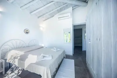 Letto o letti in una camera di Villa Aurosa