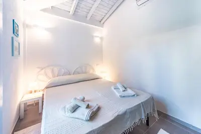 Letto o letti in una camera di Villa Aurosa