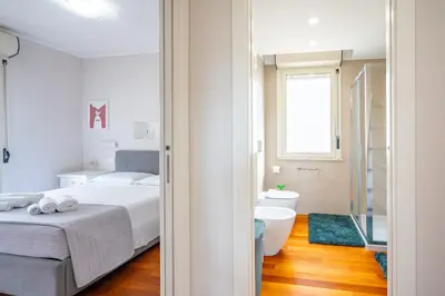 Letto o letti in una camera di Via Libeccio