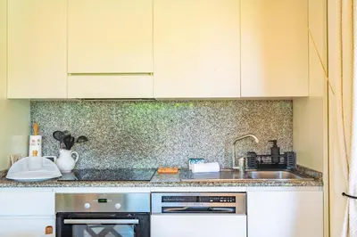Cucina o angolo cottura di Villa Ulivo - Spiaggia di Porto Giunco a piedi