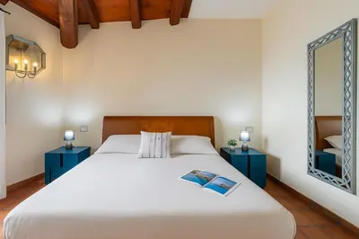 Letto o letti in una camera di Rokkaria Terrace - Villasimius
