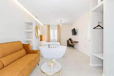 Area soggiorno di Sofì Luxury Suite