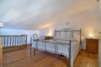 Letto o letti in una camera di Il Rudere