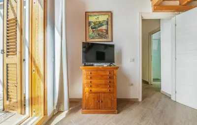 TV o dispositivi per l'intrattenimento presso Stunning Home In Carloforte With Wifi