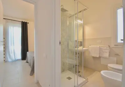 Bagno di ISA - Residence in Costa Rei just 450 meters from the beach, apartments with air conditioning and outdoor private area