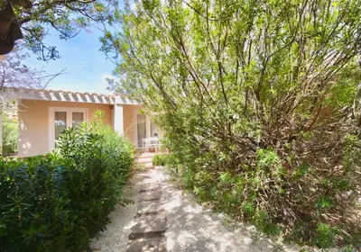 Giardino di ISA - Residence in Costa Rei just 450 meters from the beach, apartments with air conditioning and outdoor private area