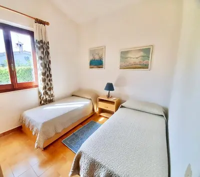 Letto o letti in una camera di Villa Brezza in Costa Rei just 300 mt from the sea