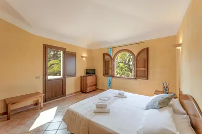 Letto o letti in una camera di Baia delle Palme 4 people Apartment Premium