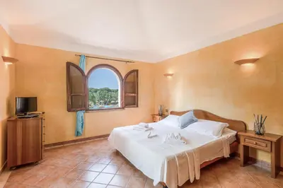 Letto o letti in una camera di Baia delle Palme 4 people Apartment Premium