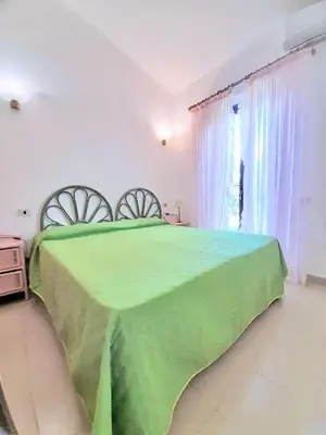 Letto o letti in una camera di Villa Vivace in Costa Rei just 300 mt from the sea