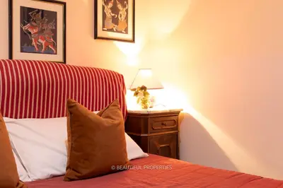 Letto o letti in una camera di Greenway Rifugio con Patio a 2 min dal mare