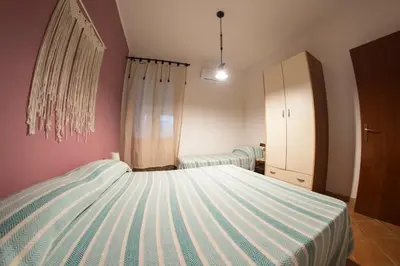Letto o letti in una camera di Maluma