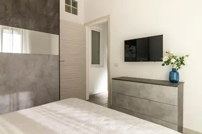 Letto o letti in una camera di Cagliari Center - San Benedetto House 2