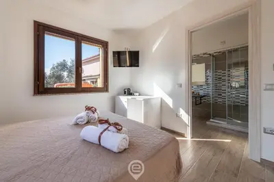 Letto o letti in una camera di Villa Monica