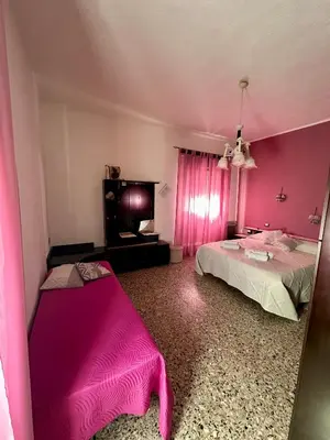 Letto o letti in una camera di Casa Mirko