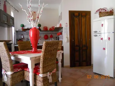 Cucina o angolo cottura di Holiday Home Haus 'Red Coral' mit Gemeinschaftspool by Interhome