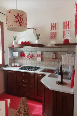 Cucina o angolo cottura di Holiday Home Haus 'Red Coral' mit Gemeinschaftspool by Interhome