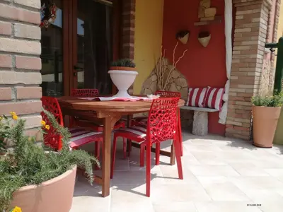 Patio o area all'aperto di Holiday Home Haus 'Red Coral' mit Gemeinschaftspool by Interhome
