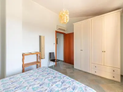 Letto o letti in una camera di Apartment Haus mit Panoramablick in Chia in natürlicher Umgebung by Interhome