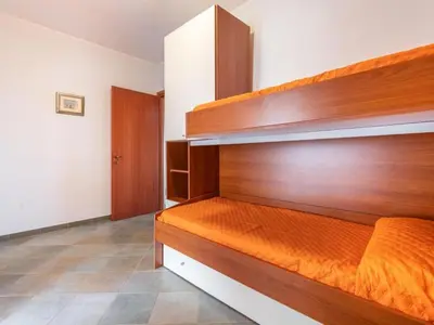 Letto o letti in una camera di Apartment Haus mit Panoramablick in Chia in natürlicher Umgebung by Interhome