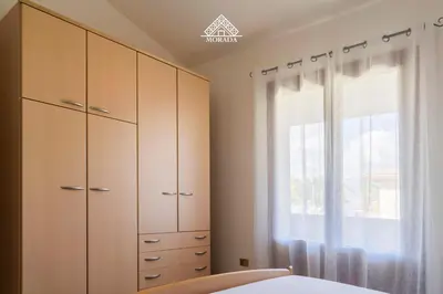 Letto o letti in una camera di Casa Torre di Nora - Morada