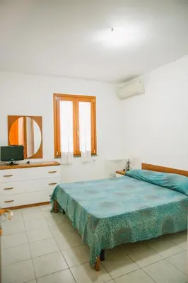 Letto o letti in una camera di Casa vacanze Giomari
