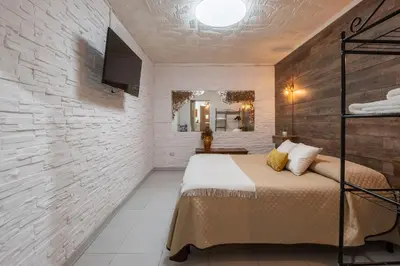 Letto o letti in una camera di Su Lizu
