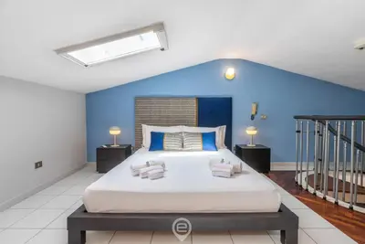 Letto o letti in una camera di Charm in Via Abba